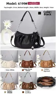 Detail view of ruched cloud bag with metal chain strap and multiple color options