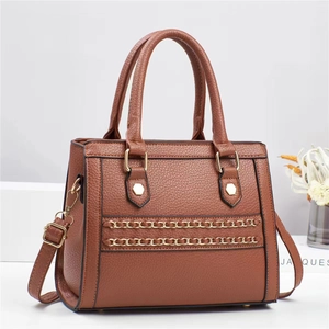 Brown litchi texture handbag with double handles and decorative gold chains for women