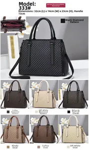 Detail view of stylish quilted and printed tote bag with dimensions 32x14x23cm