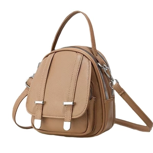 Minimalist brown crossbody mini bag with multi-layer zippers and versatile straps