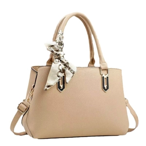 Fashionable beige macaron shoulder bag with pebble leather texture and silk scarf handle