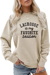 Detail of ribbed cuffs and Lacrosse is My Favorite Season print on a sand beige sweatshirt