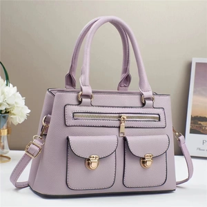 Purple lychee grain leather handbag with gold hardware and multiple front pockets