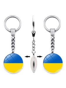 Double-sided metal keychain with Ukraine flag dome showing front, back and side views