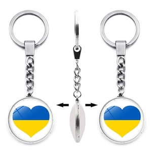 Double-sided heart keychain with Ukraine flag colors and polished silver metal frame