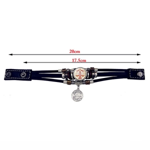 Detailed view of multilayer leather bracelet with zodiac charm and 20cm length measurement