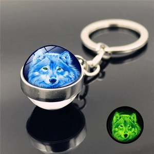 Luminous howling wolf glass ball keychain with double-sided design and glow effect