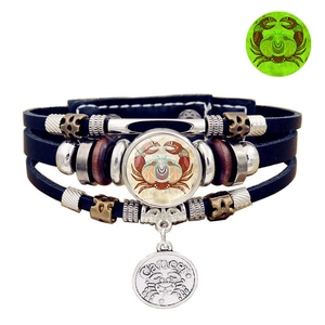 Luminous Cancer constellation leather bracelet with woven layers and vintage charms