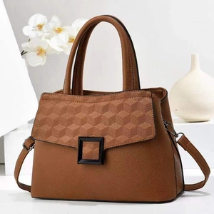 Brown large capacity leather handbag with geometric embossed flap and shoulder strap