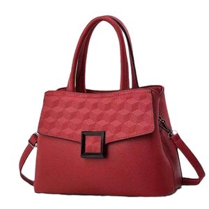 Deep red lychee leather tote bag with geometric embossed flap and square metal buckle