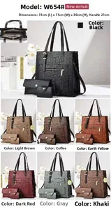 Three-piece tote bag set with stone texture including a large shoulder bag and small pouches
