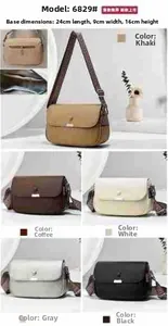 Detail view of stylish crossbody bag showing dimensions 24x9x16cm and metal lock