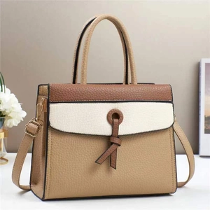 Three-tone color block shoulder bag in lychee texture leather with knot detail