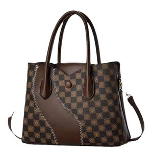 Vintage checkered tote bag with brown leather patchwork and adjustable shoulder strap