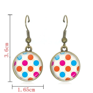 Detailed view of retro polka dot drop earrings showing dimensions of 3.6cm by 1.65cm