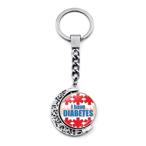 Silver rotating keychain with Star of Life and I Have Diabetes medical alert warning