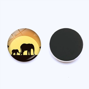 Elephant silhouette glass refrigerator magnet with 25mm diameter and magnetic back