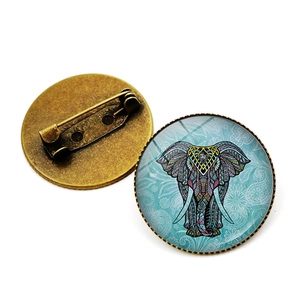 Vintage elephant glass cabochon brooch pin with antique bronze bohemian pattern finish