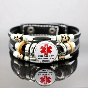 Macro detail of multi-layer leather medical bracelet with Emergency Information Star of Life