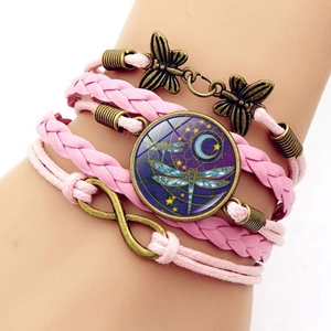 Pink bohemian leather multi-layer braided bracelet with gold butterfly and moon dragonfly charms