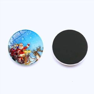Macro view of Santa Claus sleigh glass fridge magnet with magnetic back display