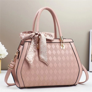 Quilted pink faux leather handbag with silk scarf handle and golden hardware accessories