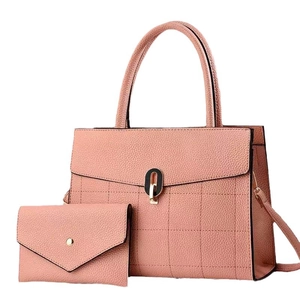 Pink lychee grain leather tote bag set with golden U-shaped buckle and matching wallet