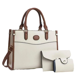 Three-piece cream beige faux leather tote bag set with brown handles and gold hardware