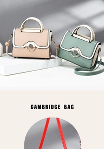 Detail of trendy crossbody bag showing the metal ring buckle and faux leather texture
