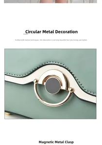 Detail of green contrast handbag featuring a circular gold metal ring and magnetic clasp