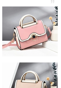 Detail view of pink and beige patchwork handbag with wavy flap and gold circular buckle