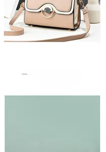 Detail of mint green lychee pattern PU leather and beige crossbody bag with metal ring