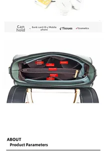 Detail view of the multi-compartment interior layout in a stylish bicolor handbag