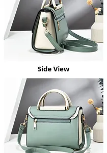 Side view of a contrast-color green and beige crossbody bag with premium metal hardware