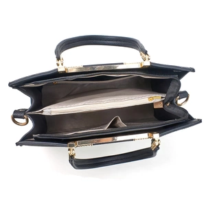 Internal structure of black bucket bag showing multiple layers and zipper pocket