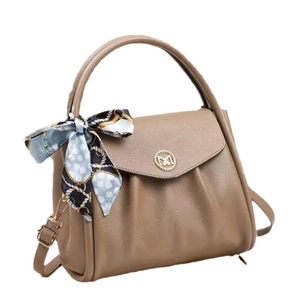 Fashionable khaki pleated handbag with gold M logo and decorative polka dot silk scarf