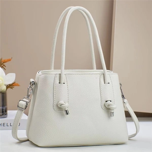 White macaron tote bag with knot detail and detachable strap in premium pebble texture