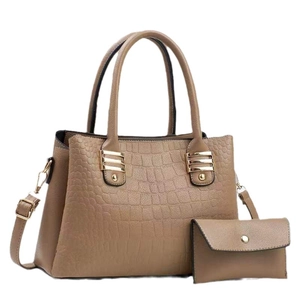 Brown crocodile embossed tote bag set with matching pouch and gold hardware accessories