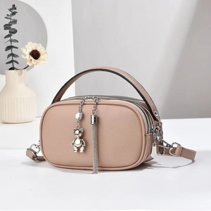 Elegant beige multi-layer camera bag with litchi texture and metal bear tassel