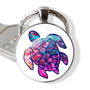 Porte-clés tortue marine en verre coloré avec un design artistique fluide et vibrant