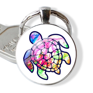 Porte-clés tortue colorée avec cabochon en verre rond et anneau en métal argenté