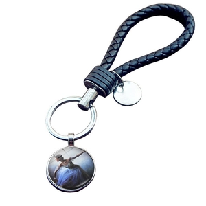 Portachiavi ballerina artistica con corda in pelle intrecciata a mano e anello di metallo