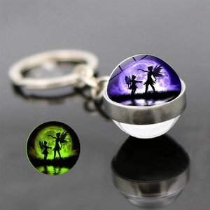 Porte-clés fée lumineux avec ailes de papillon et boule de verre phosphorescente