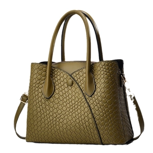 Army green tote bag with crocodile texture, double handles, and adjustable shoulder strap