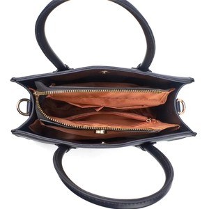 Top view of leather tote showing internal compartments and large storage capacity