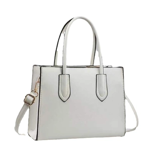 Elegant white faux leather tote bag with cross-grain texture and golden hardware accents