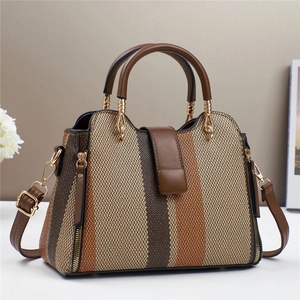 Sac à main en toile à rayures contrastées avec poignées en cuir et bandoulière chic