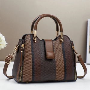 Sac à main bicolore en toile avec lanières en cuir marron et rayures verticales