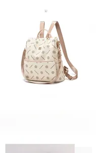 Detail of premium off-white PU leather backpack with elegant Ralabhan monogram print