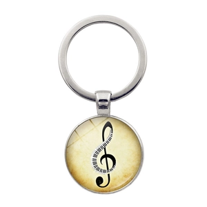 Vintage piano key heart keychain with treble clef musical note on a silver ring